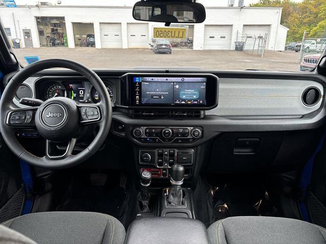 Photo of 2024 Hydro Blue Pearlcoat Jeep Wrangler 4xe