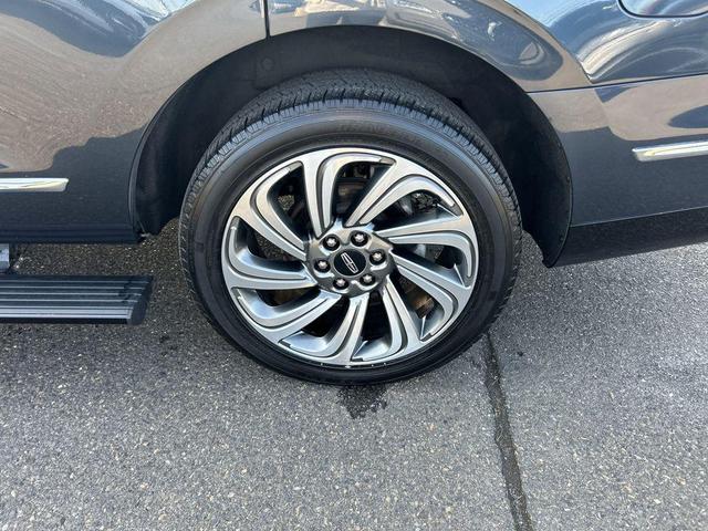 Photo of 2024 Blue Metallic Lincoln Navigator