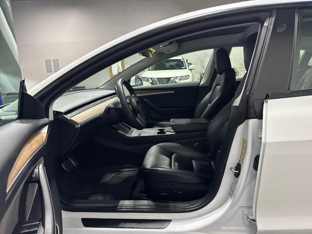 Photo of 2021 Pearl White Multi Tesla Model 3