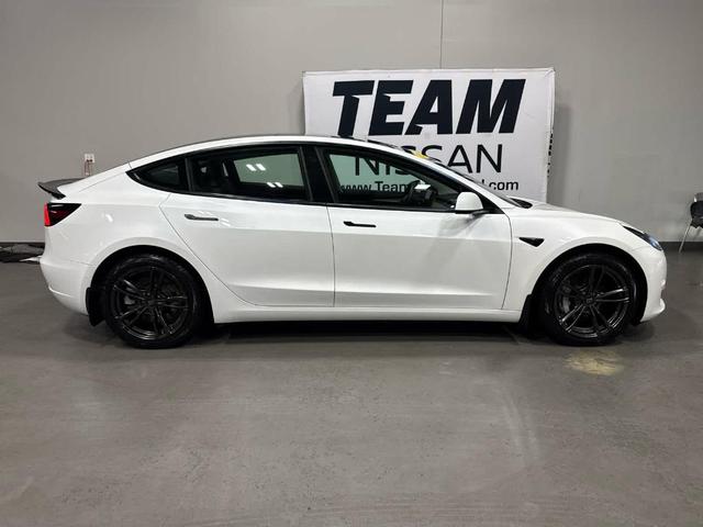 Photo of 2021 Pearl White Multi Tesla Model 3