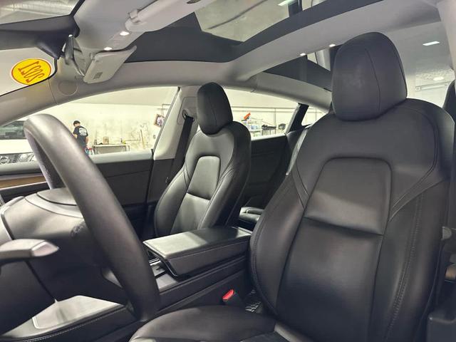 Photo of 2021 Pearl White Multi Tesla Model 3