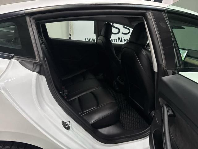 Photo of 2021 Pearl White Multi Tesla Model 3