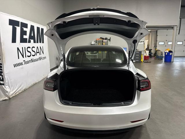 Photo of 2021 Pearl White Multi Tesla Model 3