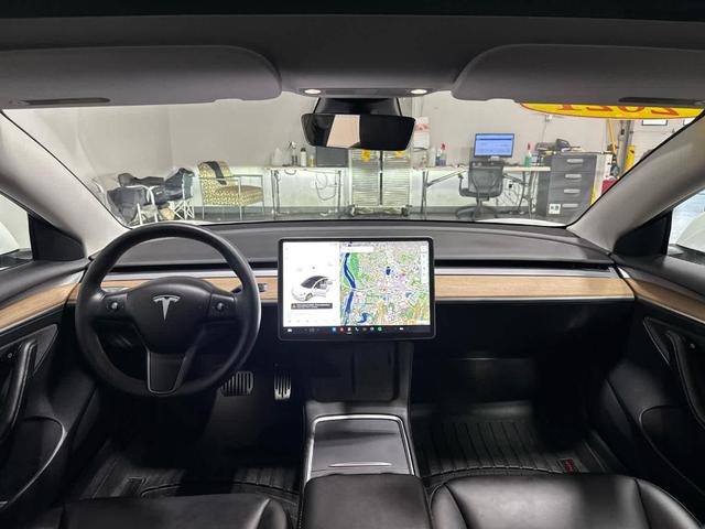 Photo of 2021 Pearl White Multi Tesla Model 3