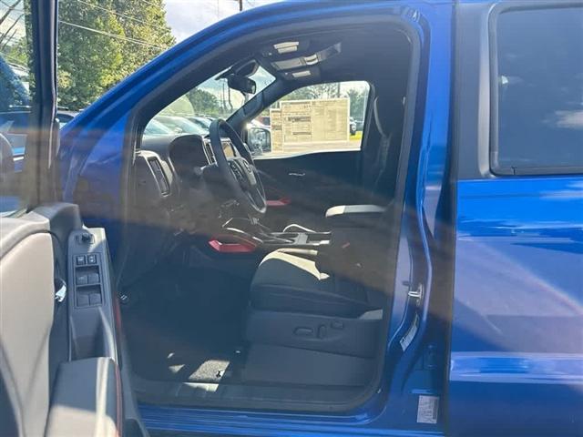 Photo of 2025 Bluestone Pearl Nissan Frontier