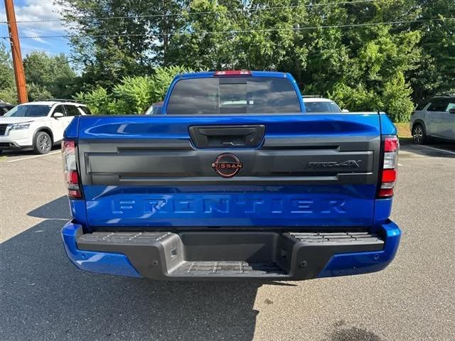 Photo of 2025 Bluestone Pearl Nissan Frontier