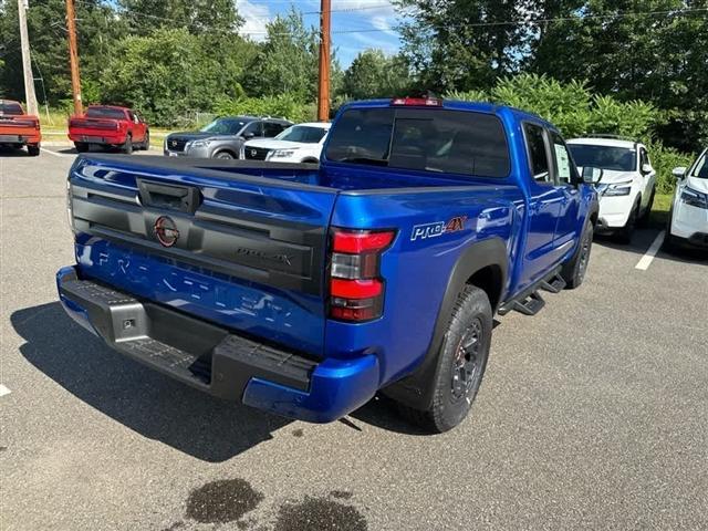 Photo of 2025 Bluestone Pearl Nissan Frontier