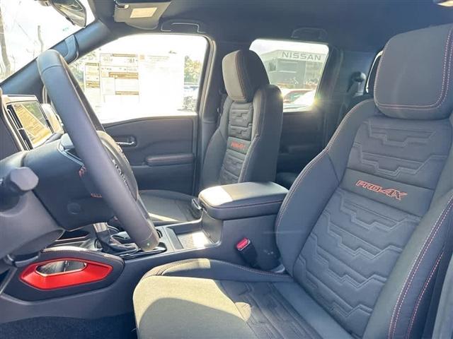 Photo of 2025 Bluestone Pearl Nissan Frontier