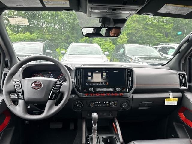 Photo of 2025 Glacier White Nissan Frontier