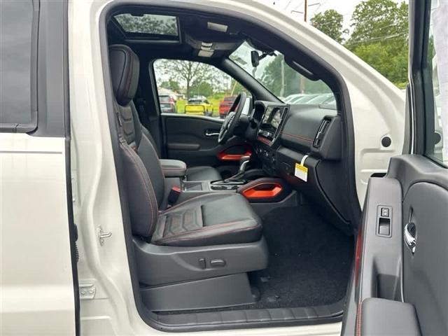 Photo of 2025 Glacier White Nissan Frontier