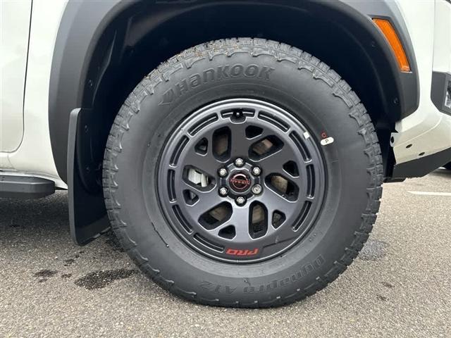 Photo of 2025 Glacier White Nissan Frontier