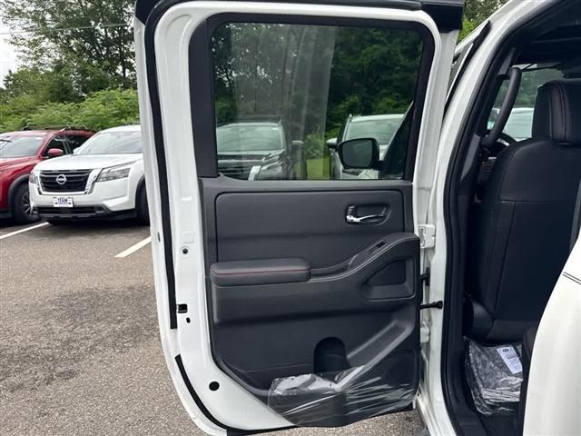 Photo of 2025 Glacier White Nissan Frontier