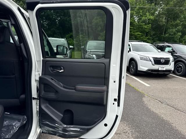 Photo of 2025 Glacier White Nissan Frontier