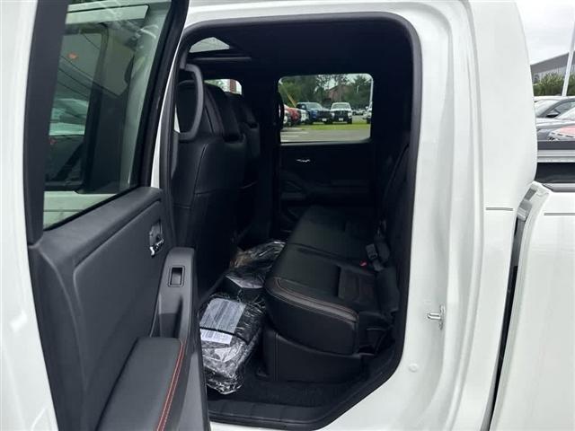 Photo of 2025 Glacier White Nissan Frontier