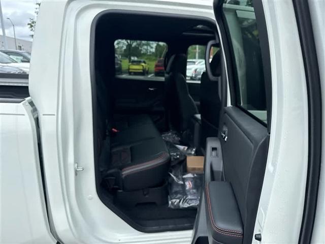Photo of 2025 Glacier White Nissan Frontier