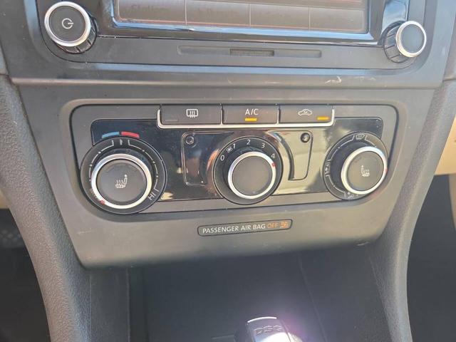 Photo of 2014 Tempest Blue Metallic Volkswagen Jetta SportWagen