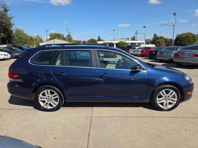 Photo of 2014 Tempest Blue Metallic Volkswagen Jetta SportWagen