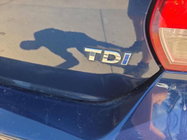 Photo of 2014 Tempest Blue Metallic Volkswagen Jetta SportWagen