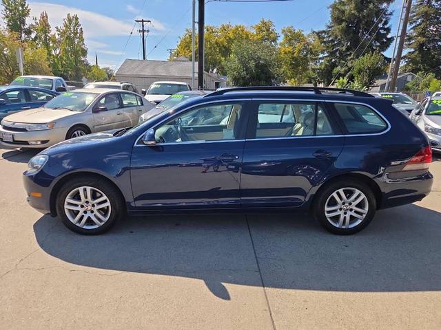 Photo of 2014 Tempest Blue Metallic Volkswagen Jetta SportWagen