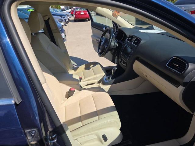 Photo of 2014 Tempest Blue Metallic Volkswagen Jetta SportWagen