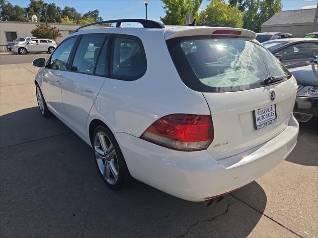 Photo of 2013 Candy White Volkswagen Jetta SportWagen