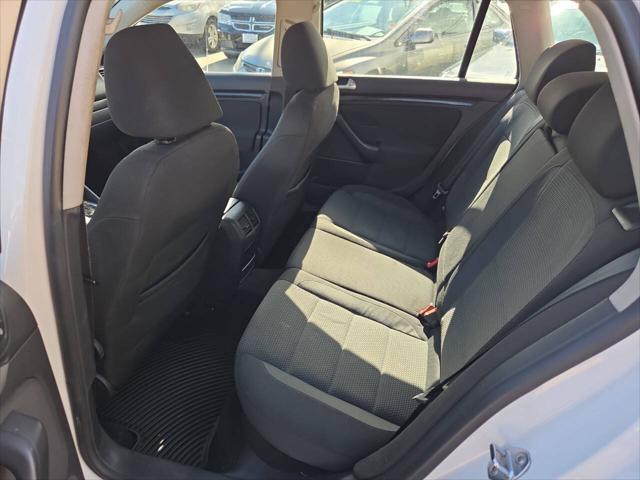 Photo of 2013 Candy White Volkswagen Jetta SportWagen