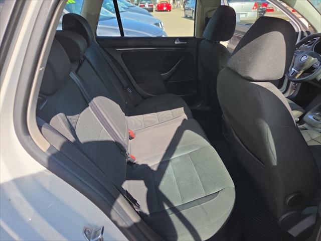 Photo of 2013 Candy White Volkswagen Jetta SportWagen