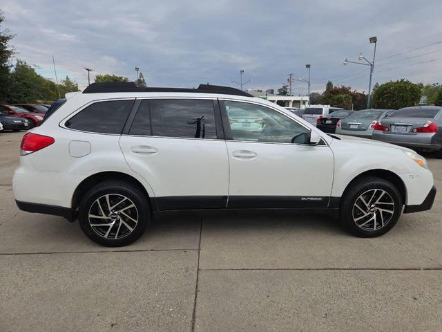 Photo of 2014 Satin White Pearl Subaru Outback