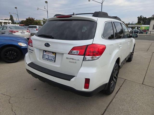 Photo of 2014 Satin White Pearl Subaru Outback