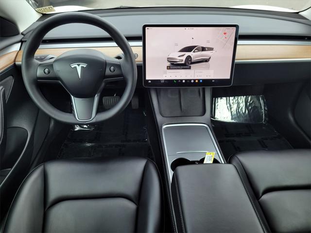 Photo of 2023 Pearl White Multi-Coat Tesla Model 3