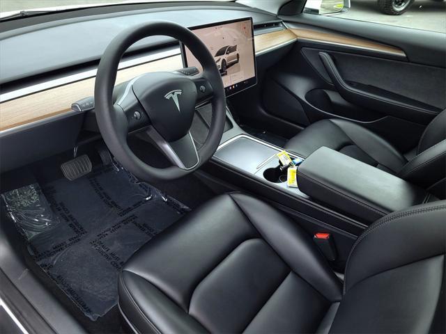 Photo of 2023 Pearl White Multi-Coat Tesla Model 3