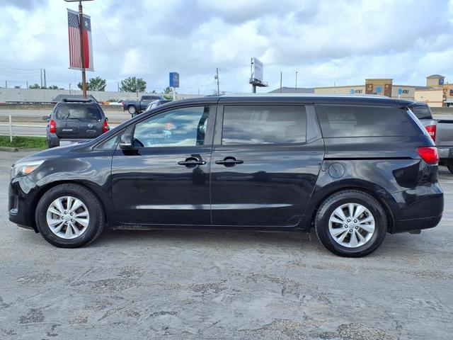 Photo of 2017 Aurora Black Kia Sedona