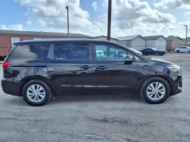 Photo of 2017 Aurora Black Kia Sedona