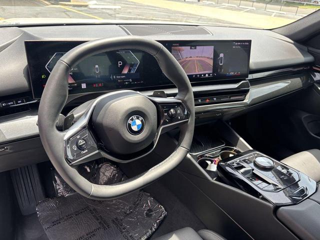 Photo of 2024 Mineral White Metallic BMW 530