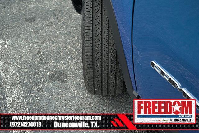 Photo of 2023 Laser Blue Pearlcoat Jeep Compass