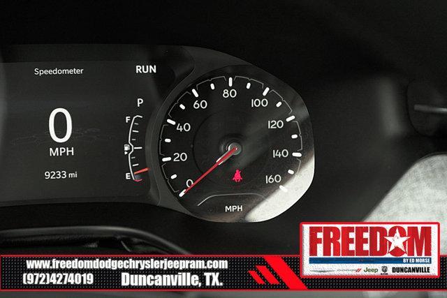 Photo of 2023 Laser Blue Pearlcoat Jeep Compass