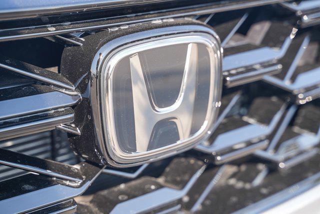 Photo of 2026 Solar Silver Metallic Honda CR-V Hybrid