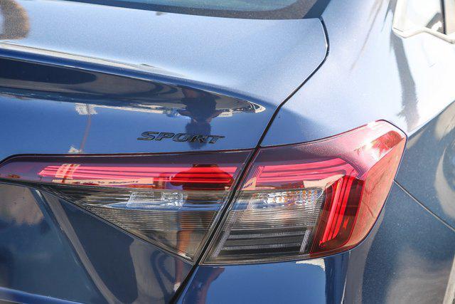 Photo of 2026 Blue Lagoon Pearl Honda Civic