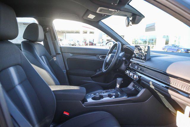 Photo of 2026 Blue Lagoon Pearl Honda Civic