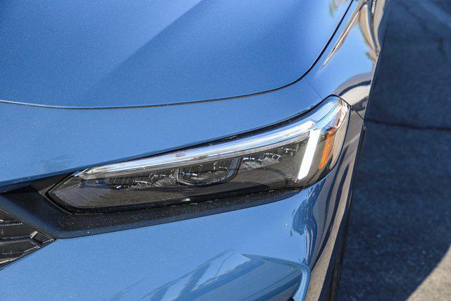 Photo of 2026 Blue Lagoon Pearl Honda Civic