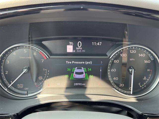 Photo of 2022 Stellar Black Metallic Cadillac XT5