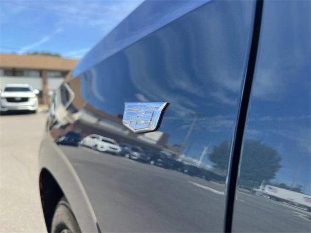 Photo of 2025 Deep Sea Metallic Cadillac Escalade