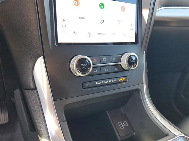 Photo of 2024 Black Metallic Ford Edge