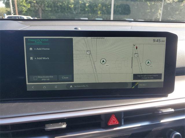 Photo of 2025 Cityscape Green Kia Sorento Hybrid