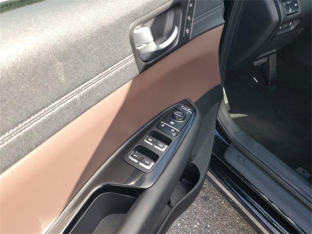 Photo of 2019 Ebony Black Kia Optima