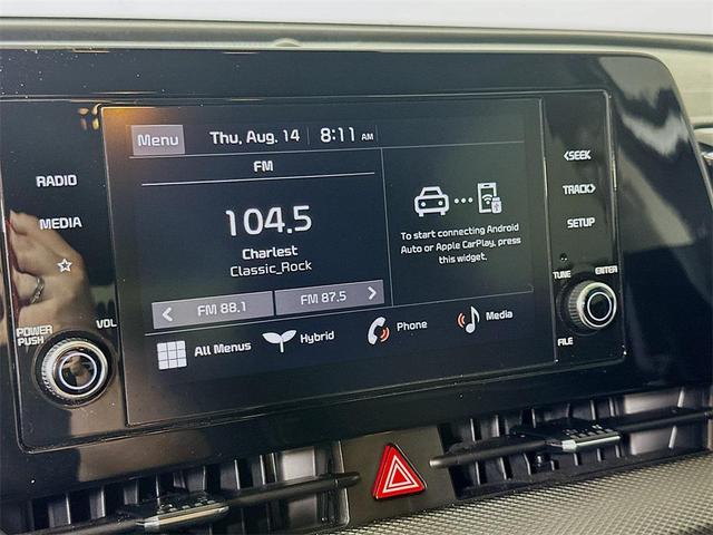 Photo of 2023 Snow White Pearl Kia Sportage Hybrid