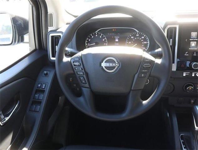 Photo of 2025 Glacier White Nissan Frontier