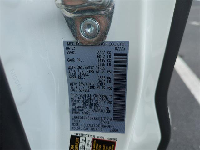 Photo of 2025 Glacier White Nissan Frontier