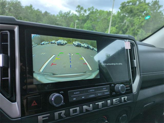 Photo of 2025 Glacier White Nissan Frontier