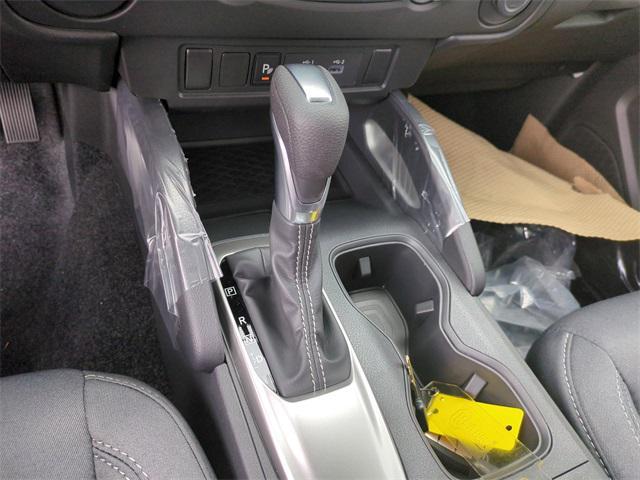 Photo of 2025 Glacier White Nissan Frontier